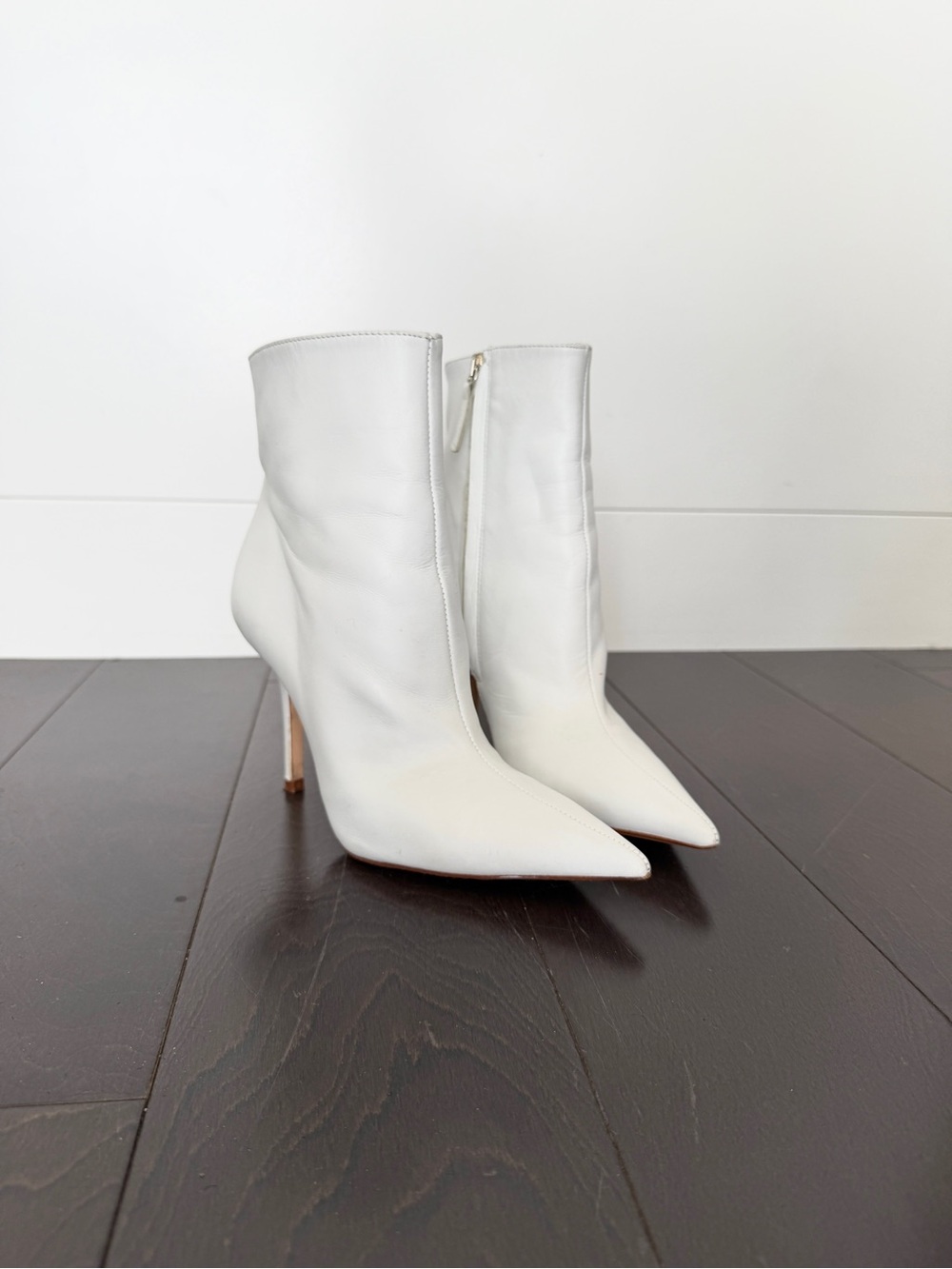 White leather pointy high boots